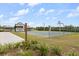 Community basketball court with signage promoting an active lifestyle in a friendly atmosphere at 9846 Sw 106Th Ct Ocala, F, Ocala, FL 34481