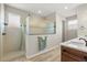 Modern bathroom featuring frameless glass enclosed shower and wood look tile floors at 9846 Sw 106Th Ct Ocala, F, Ocala, FL 34481