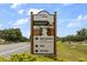 Community sign indicating the location of golf courses, pool, and pub for residents' enjoyment at 9846 Sw 106Th Ct Ocala, F, Ocala, FL 34481