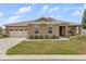 Charming single-story home with manicured lawn, stone accents, and a neutral color palette at 9846 Sw 106Th Ct Ocala, F, Ocala, FL 34481