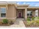 Charming home exterior with stone accents, lush landscaping, and a welcoming front entrance at 9846 Sw 106Th Ct Ocala, F, Ocala, FL 34481