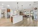 Spacious open-concept kitchen featuring a large island, stainless steel appliances, and ample natural light at 9846 Sw 106Th Ct Ocala, F, Ocala, FL 34481