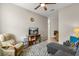 Comfortable living room with carpet floors and a stylish sofa at 9846 Sw 106Th Ct Ocala, F, Ocala, FL 34481