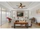 Bright living room featuring a built-in entertainment center, modern decor, and ample seating at 9846 Sw 106Th Ct Ocala, F, Ocala, FL 34481
