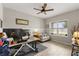 Comfortable home office with a ceiling fan, a large window, and ample natural light at 9846 Sw 106Th Ct Ocala, F, Ocala, FL 34481