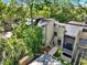 Aerial view of the community and the lush greenery and trees that surround the townhomes at 109 Crown Oaks Way # 109, Longwood, FL 32779