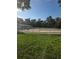 Exterior view of an equestrian area with a paddock and stable building at 109 Crown Oaks Way # 109, Longwood, FL 32779
