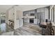 Bright kitchen featuring stainless steel appliances, gray cabinets, and a breakfast bar at 109 Crown Oaks Way # 109, Longwood, FL 32779