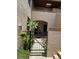 Charming condo showcasing a gated entrance, lush landscaping, and Mediterranean-style architecture at 1252 Lake Willisara Cir # Ge, Orlando, FL 32806