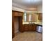 Well-equipped kitchen with a view and ample cabinet space, practical and efficient at 1252 Lake Willisara Cir # Ge, Orlando, FL 32806