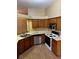 Functional kitchen with matching appliances, and ample cabinetry at 1252 Lake Willisara Cir # Ge, Orlando, FL 32806