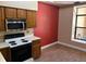 Functional kitchen with matching appliances, and ample cabinetry at 1252 Lake Willisara Cir # Ge, Orlando, FL 32806