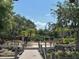 Lakeside community pool with a view from a wooden dock, perfect for relaxation and recreation at 1252 Lake Willisara Cir # Ge, Orlando, FL 32806