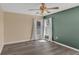 Inviting bedroom with natural light from two windows and a ceiling fan at 126 San Carlo Rd, Davenport, FL 33896