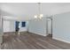 Open living area with sleek flooring, fresh paint, and modern lighting, perfect for entertaining or relaxing at 126 San Carlo Rd, Davenport, FL 33896