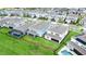 Aerial view of backyard with fence, green lawn, and neighborhood at 13323 Panama Beach Ct, Orlando, FL 32827
