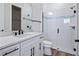 Modern bathroom with white vanity, quartz countertop, and glass-enclosed shower at 13323 Panama Beach Ct, Orlando, FL 32827