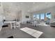 Large bright clubhouse lounge area with ample seating and kitchenette, perfect for social gatherings at 13323 Panama Beach Ct, Orlando, FL 32827