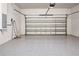 Clean, spacious garage with epoxy flooring and electric vehicle charging outlet at 13323 Panama Beach Ct, Orlando, FL 32827