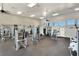 Well-equipped fitness center featuring a variety of machines, weights, and ample space for a comprehensive workout at 13323 Panama Beach Ct, Orlando, FL 32827