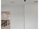 View of a staircase with dark wood banister and white walls at 13323 Panama Beach Ct, Orlando, FL 32827