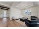 Bright living room with stylish furniture, modern lighting, and wood-look flooring at 13323 Panama Beach Ct, Orlando, FL 32827