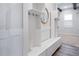 Mudroom with built-in storage, including shelves, hooks, bench, and drawers for organized entryway at 13323 Panama Beach Ct, Orlando, FL 32827