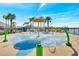 A fun community splash pad with colorful features, perfect for cooling off and enjoying outdoor water play on a sunny day at 13323 Panama Beach Ct, Orlando, FL 32827