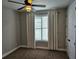 Bedroom featuring standard closet, plush carpet, neutral walls, and a bright window with curtains at 1414 Stickley Ave, Kissimmee, FL 34747