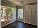 Sunlit dining room featuring hardwood floors, and built-in cabinets at 1414 Stickley Ave, Kissimmee, FL 34747