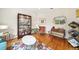 Inviting sitting area with hardwood floors, accent furniture, and decor, creating a cozy and stylish space at 1420 Palmer Ave, Winter Park, FL 32789
