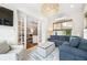 Inviting sunroom with access to the main living area and a view of the backyard at 1420 Palmer Ave, Winter Park, FL 32789