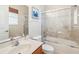 Bathroom featuring a single sink vanity, a toilet, and a shower/tub combination with glass doors at 1429 Arbitus Cir, Oviedo, FL 32765