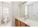 Bathroom featuring a single sink vanity, a toilet, and a shower/tub combination at 1429 Arbitus Cir, Oviedo, FL 32765