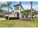 Stunning two-story home with lush landscaping and a three car garage at 1429 Arbitus Cir, Oviedo, FL 32765