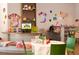 An activity room with tables and decorations create an engaging space for crafting and creative projects at 14501 Grove Resort Ave # 2451, Winter Garden, FL 34787
