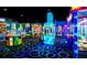 The bright and colorful arcade provides a fun and entertaining experience with a variety of games and attractions at 14501 Grove Resort Ave # 2451, Winter Garden, FL 34787