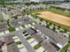 Expansive aerial view of a well-planned community with neatly arranged homes and green spaces at 15096 Chapter Way, Winter Garden, FL 34787