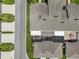 Overhead view of a residential area displaying the layout of homes, streets, and community spaces at 15096 Chapter Way, Winter Garden, FL 34787