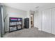 This bedroom includes a closet, neutral walls, carpeted floors and an open doorway to the other rooms at 15096 Chapter Way, Winter Garden, FL 34787
