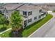 Stunning aerial view of the property showcasing its well-maintained lawn, landscaping, and neighborhood setting at 15096 Chapter Way, Winter Garden, FL 34787