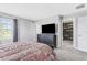 Spacious main bedroom with a large dresser and walk-in closet at 15096 Chapter Way, Winter Garden, FL 34787