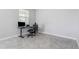 Bright office space with tile flooring, a computer desk, and natural light from the window at 15096 Chapter Way, Winter Garden, FL 34787