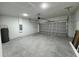 View of the garage with an automatic door opener and plenty of room for storage at 16463 Sw 55Th Court Rd, Ocala, FL 34473