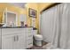 Well-lit bathroom with granite countertop vanity, modern fixtures, and shower-tub combo at 173 Villa Di Este Ter # 209, Lake Mary, FL 32746