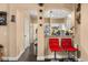 View of kitchen and bar seating area showcasing dark floors, and modern decor touches at 173 Villa Di Este Ter # 209, Lake Mary, FL 32746