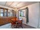 Dining area featuring a wood table, chandelier, and built in shelving at 203 N Forest Blvd, Lake Mary, FL 32746