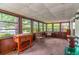 Cozy sunroom with lots of windows and natural light at 203 N Forest Blvd, Lake Mary, FL 32746