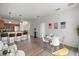 Spacious open living area with kitchen, dining area, and bar-stool seating at 2306 Valhalla Dr, Tavares, FL 32778