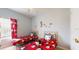 Bedroom with two twin beds, red mickey mouse comforters and decor at 2411 Caravelle Cir, Kissimmee, FL 34746
